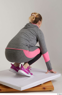  Mia Brown  1 dressed grey hoodie grey leggings kneeling pink sneakers sports whole body 0006.jpg